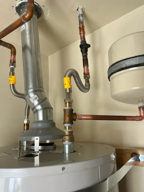 Water heater installation and plumbing repair in Walpole Heights